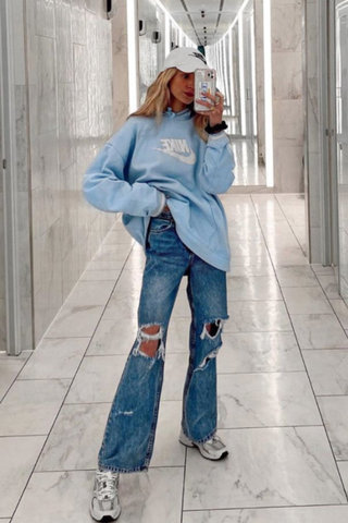 Oversized shirt with bootcut jeans